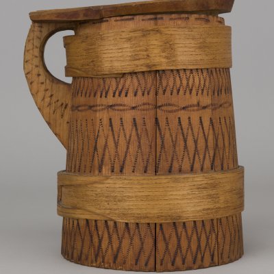  photo of the object, wooden watering can