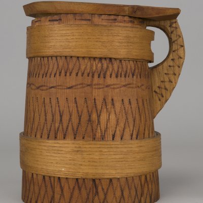 a wooden watering can from the Hutsul region