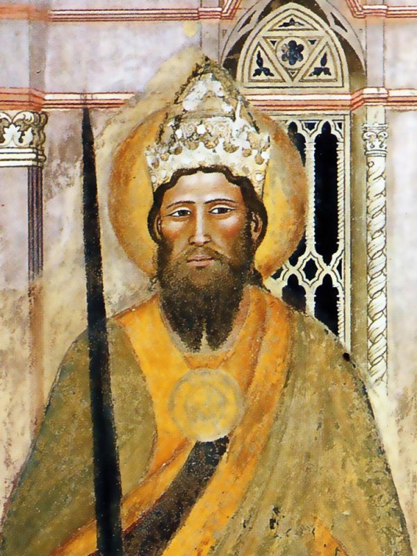 Obraz przedstawia cesarza - młodego mężczyznę z długą brodą, z tiarą na głowie, w uroczystych szatach.  