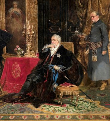 Stary król Stanisław August w czarnych szatach siedzi smutny i zamyślony na fotelu, patrzy na obraz przedstawiający Pałac na Wodzie w Łazienkach.  Za królem stoi stary sługa ubrany po szlachecku.