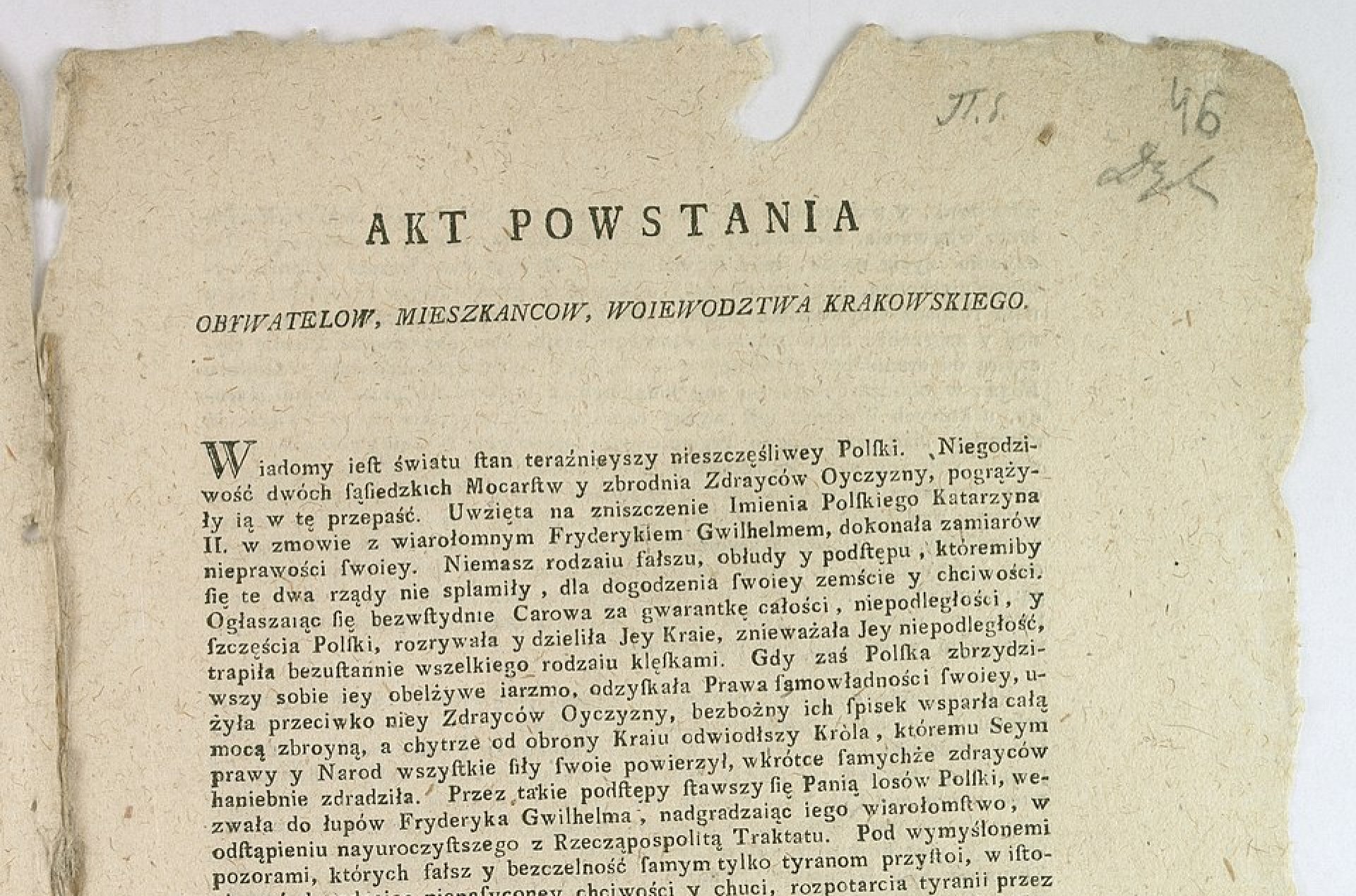 Pożółkła i nadszarpnięta kartka.