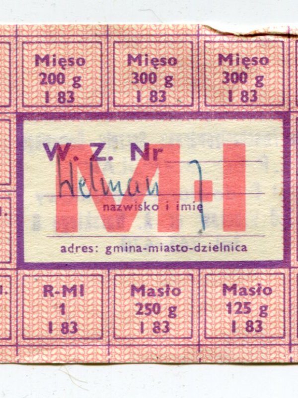 kartka żywnościowa z PRL na mięso i masło, wystawiona na nazwisko Welman. Widoczne są fioletowe, odrywane kupony z określonymi gramaturami (np. Mięso 200 g, Masło 125 g) oraz duży, różowy nadruk „M-I” na środku.